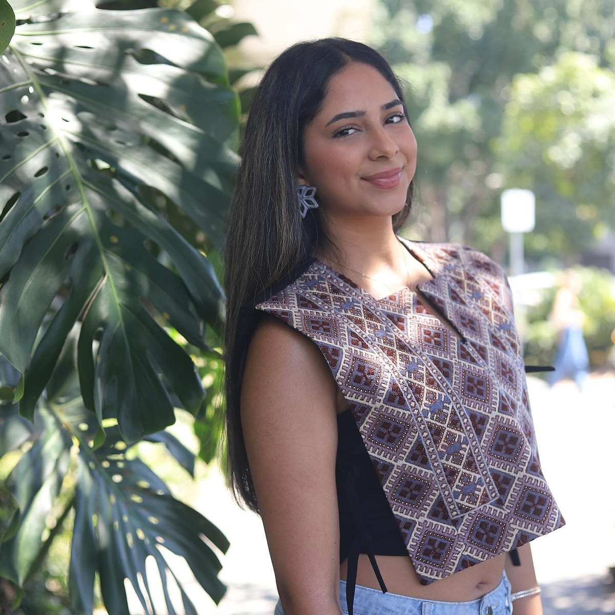 Model wearing a colourful hand-embroidered Balochi vest